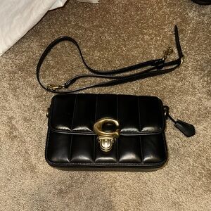 Coach Studio Quilted crossbody bag with strap and dust bag included.